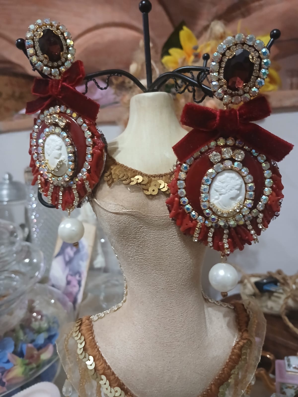 Earrings with small resin beads and a cameo